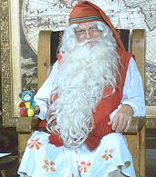 Moffie op schoot bij Santa Claus
